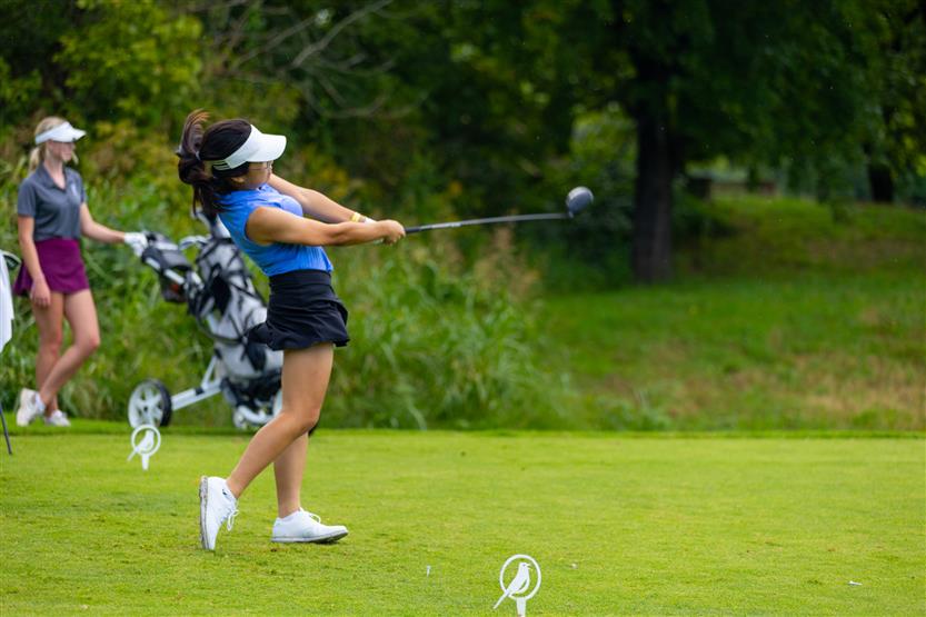 Students play golf